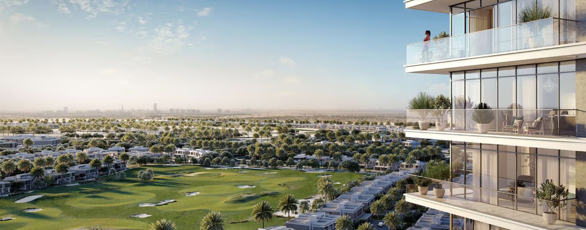 Apartment balconies overlooking a golf course and low-density villas